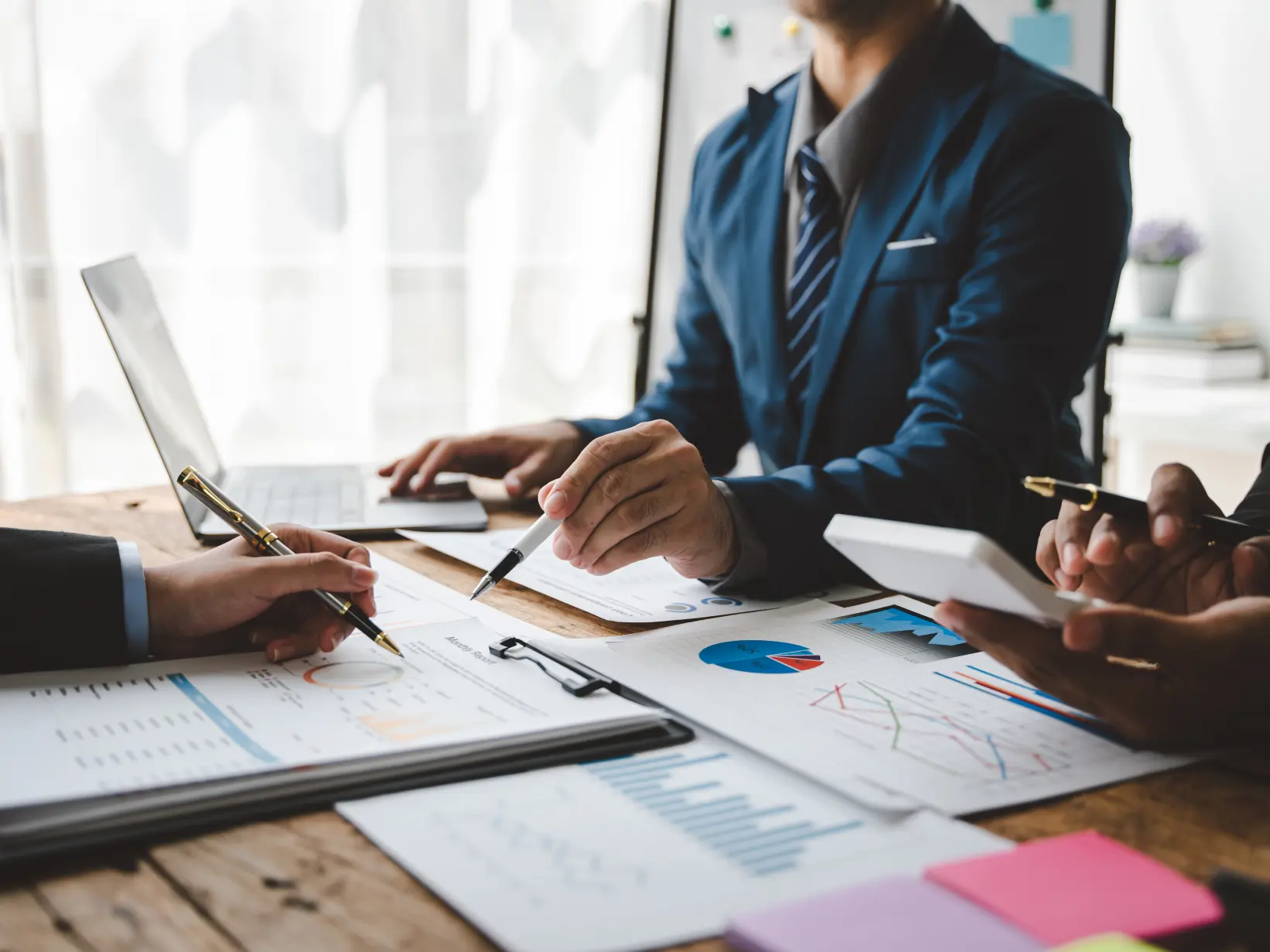 RCM firm leader reviewing client reimbursement data