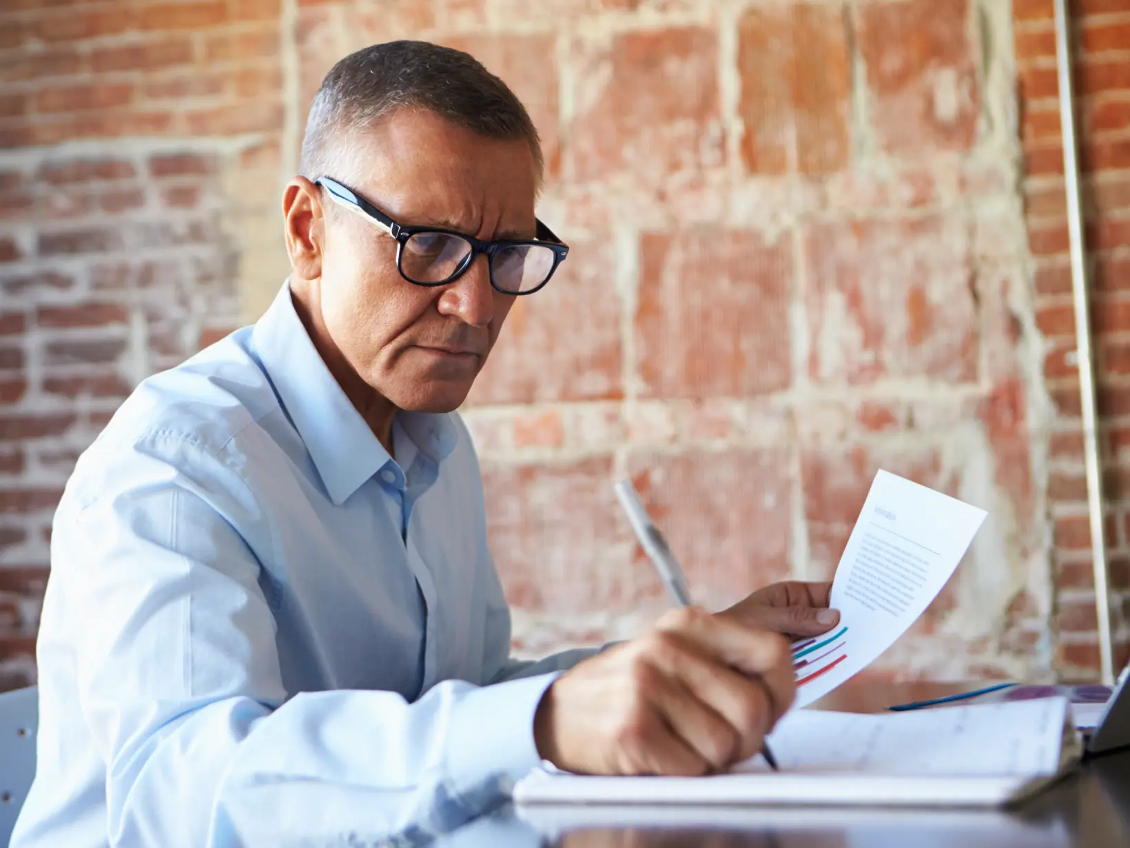 Billing director reviewing a remittance report